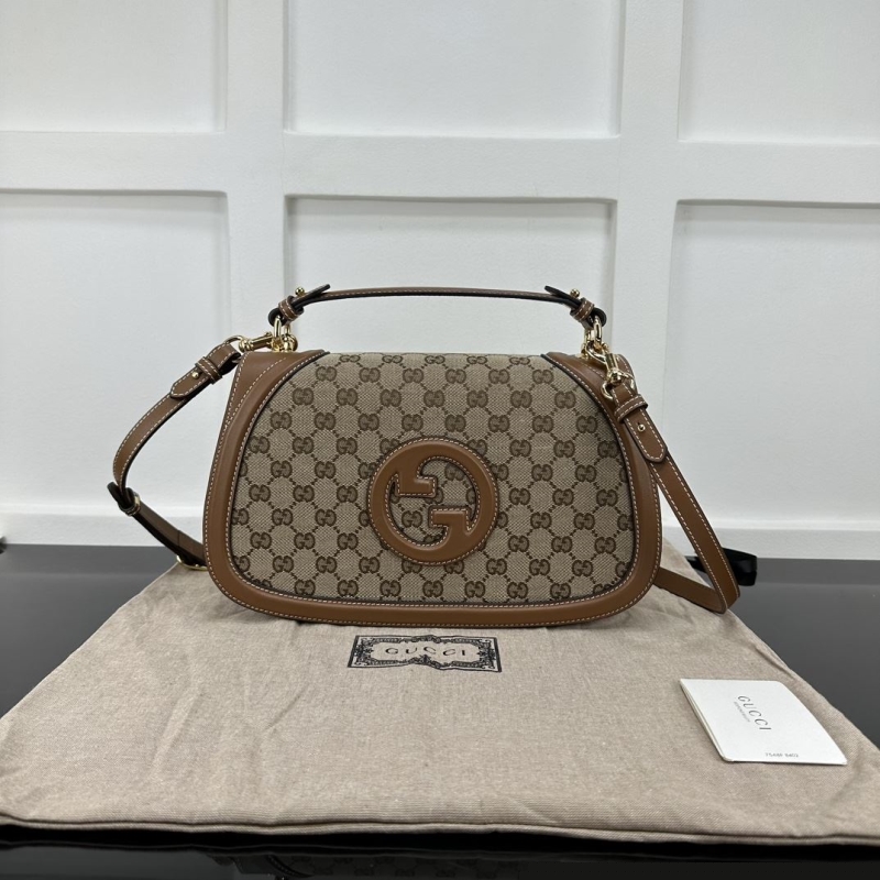 G*u*i top handle bags